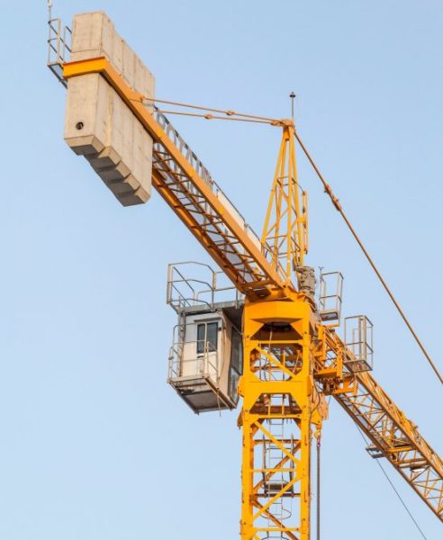 yellow-construction-crane-against-the-blue-sky